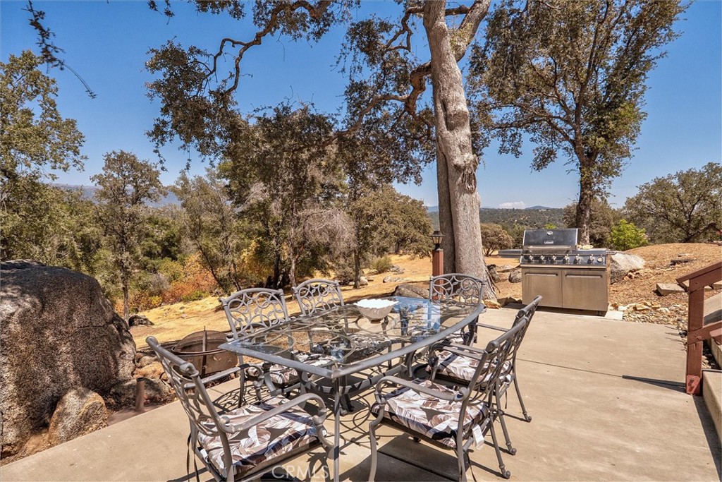 4870 Streeter Mountain Road Mariposa, CA 95338 - Photo 34 of 45 an outdoor space with seating area