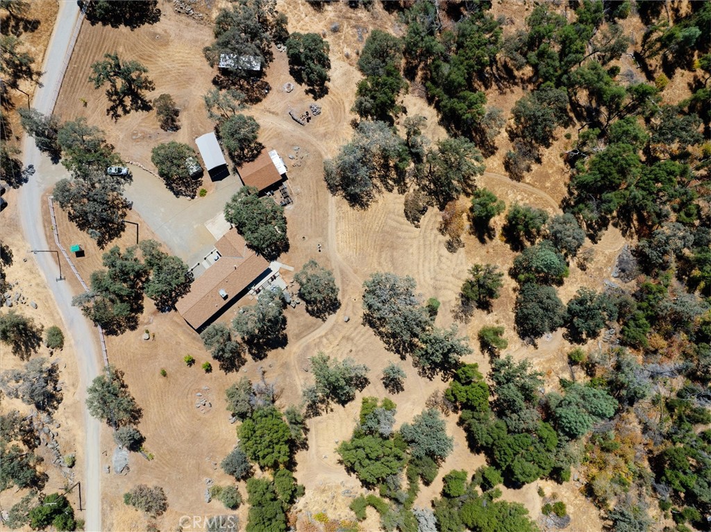 4870 Streeter Mountain Road Mariposa, CA 95338 - Photo 44 of 45 an aerial view of house with yard and parking