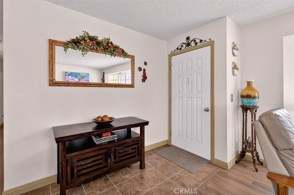 4870 Streeter Mountain Road Mariposa, CA 95338 - Photo 6 of 45 a view of room with workspace and wooden floor