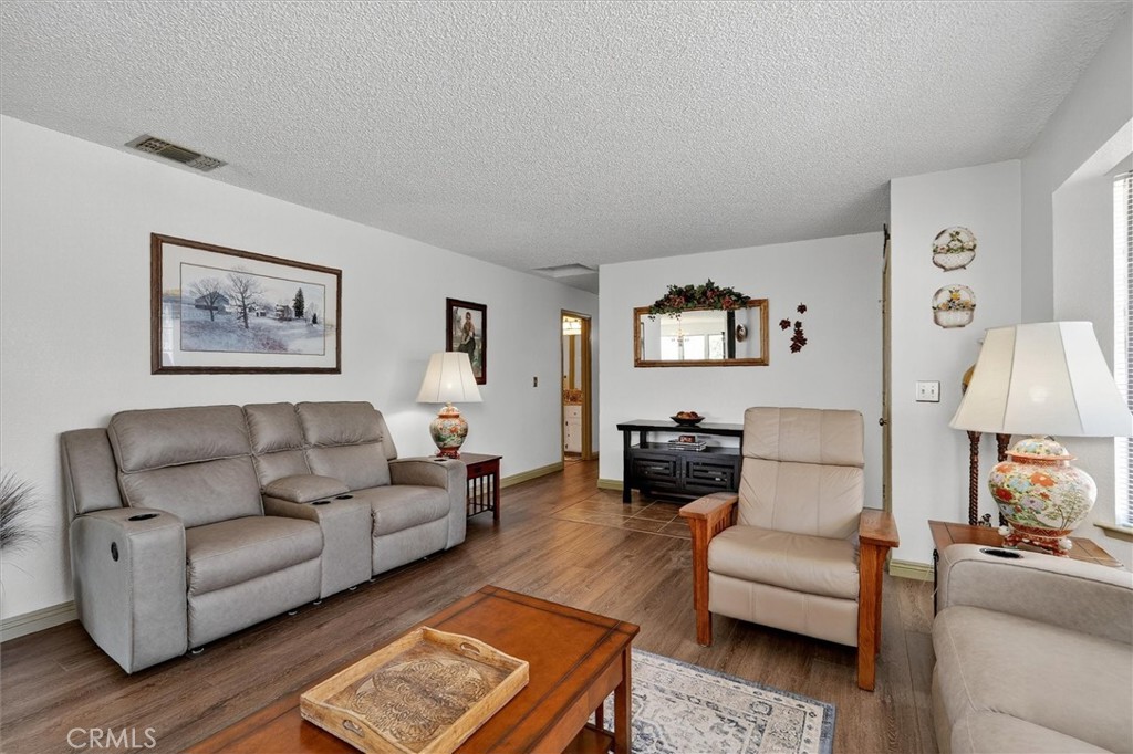 4870 Streeter Mountain Road Mariposa, CA 95338 - Photo 9 of 45 a living room with furniture and a couch