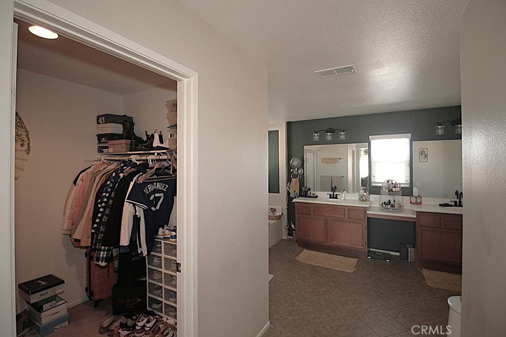 924 Condor Street Barstow, CA 92311 - Photo 37 of 52 a view of a storage & utility room