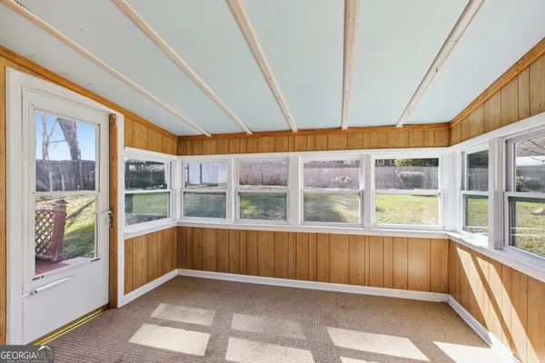 a view of a house with a large window