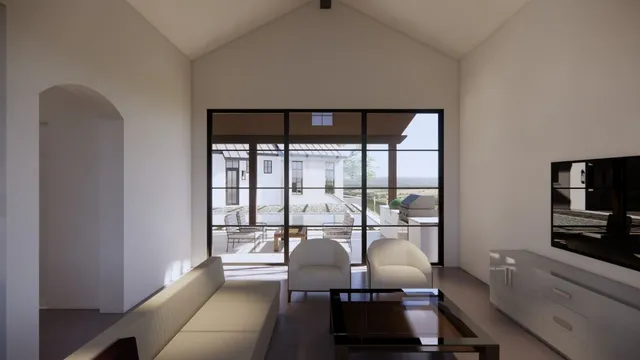 a living room with furniture and a floor to ceiling window