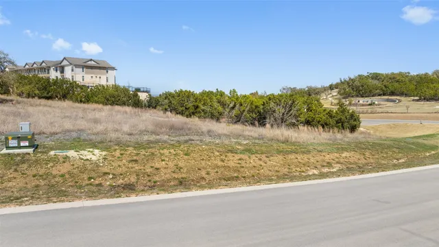 a view of a lake from a yard