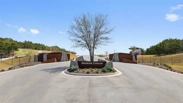 a view of a house with sitting area and garden