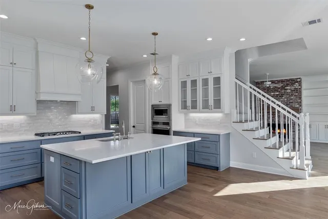 a kitchen with counter top space and a sink