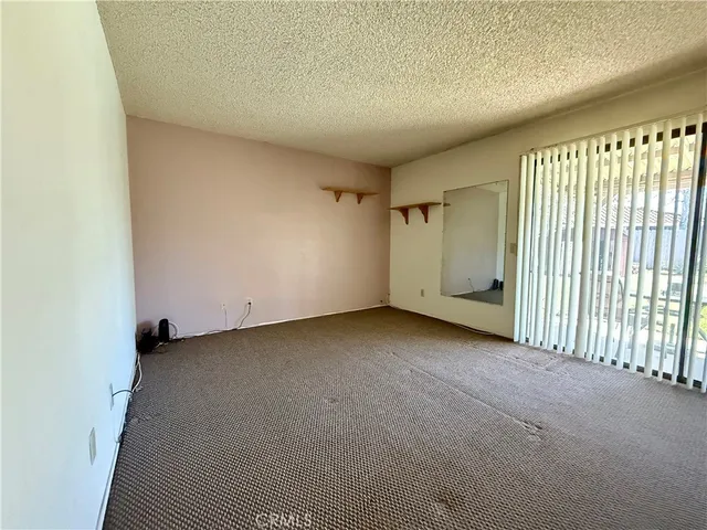 a bathroom with a sink toilet and mirror