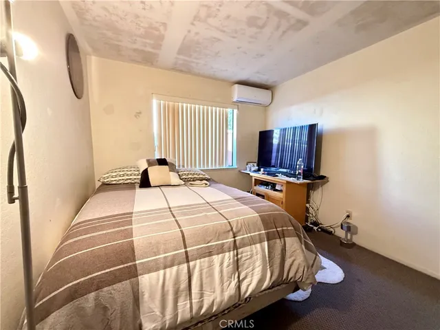 a view of a chairs and table in backyard