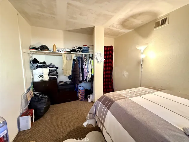 a view of a house with a yard porch and sitting area