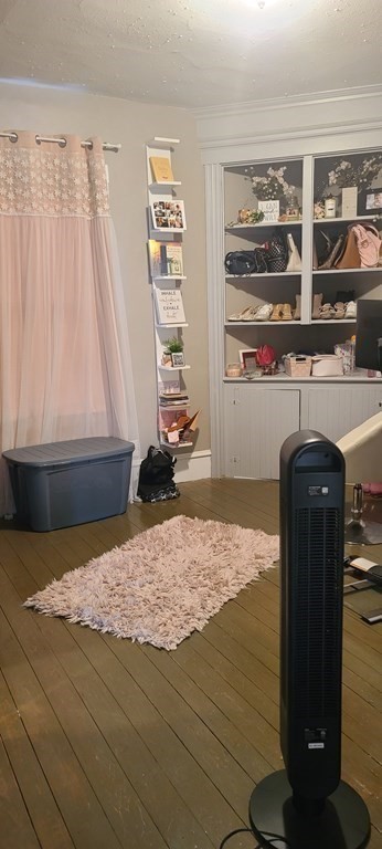 229 Cory Street Fall River, MA 02720 - Photo 14 of 30 a bed sitting in a room next to a window