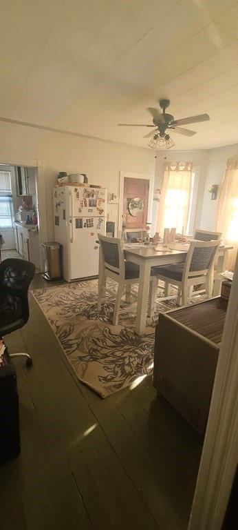 229 Cory Street Fall River, MA 02720 - Photo 15 of 30 a kitchen with kitchen island stainless steel appliances a sink stove and cabinets