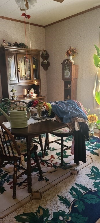 229 Cory Street Fall River, MA 02720 - Photo 4 of 30 a kitchen with a stove and a table