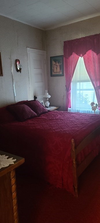229 Cory Street Fall River, MA 02720 - Photo 6 of 30 a bedroom with a bed and a window