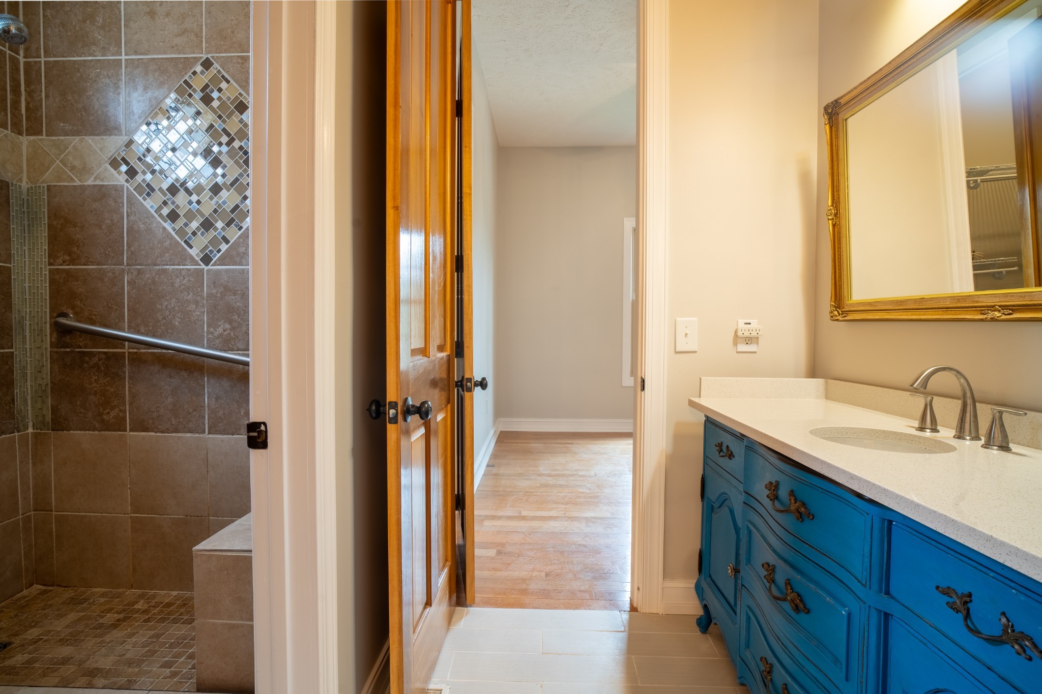 550 Laurel Crown Road Manchester, TN 37355 - Photo 72 of 87 a bathroom with a granite countertop sink a mirror and a shower