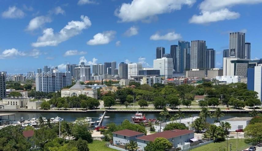 36 Northwest 6th Avenue, Unit 906 Miami, FL 33128 - Photo 24 of 37 a view of a city with tall buildings