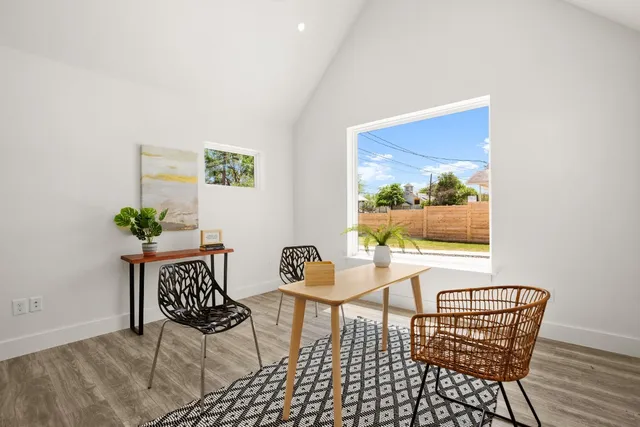 a view of a dining room with furniture