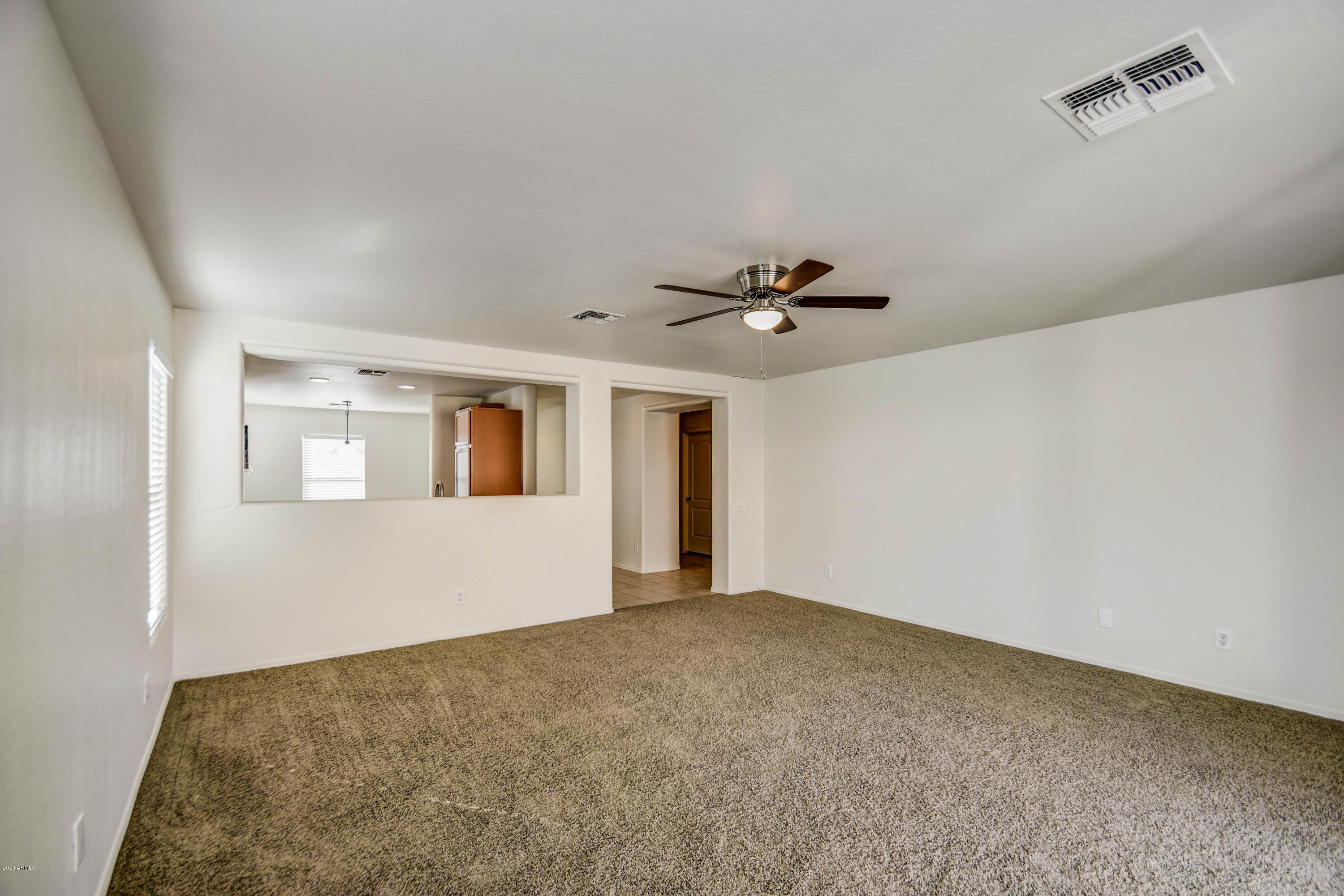 43928 West Cowpath Road Maricopa, AZ 85138 - Photo 8 of 44 living room 2