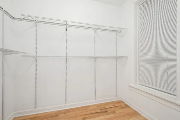a view of an empty walk in closet
