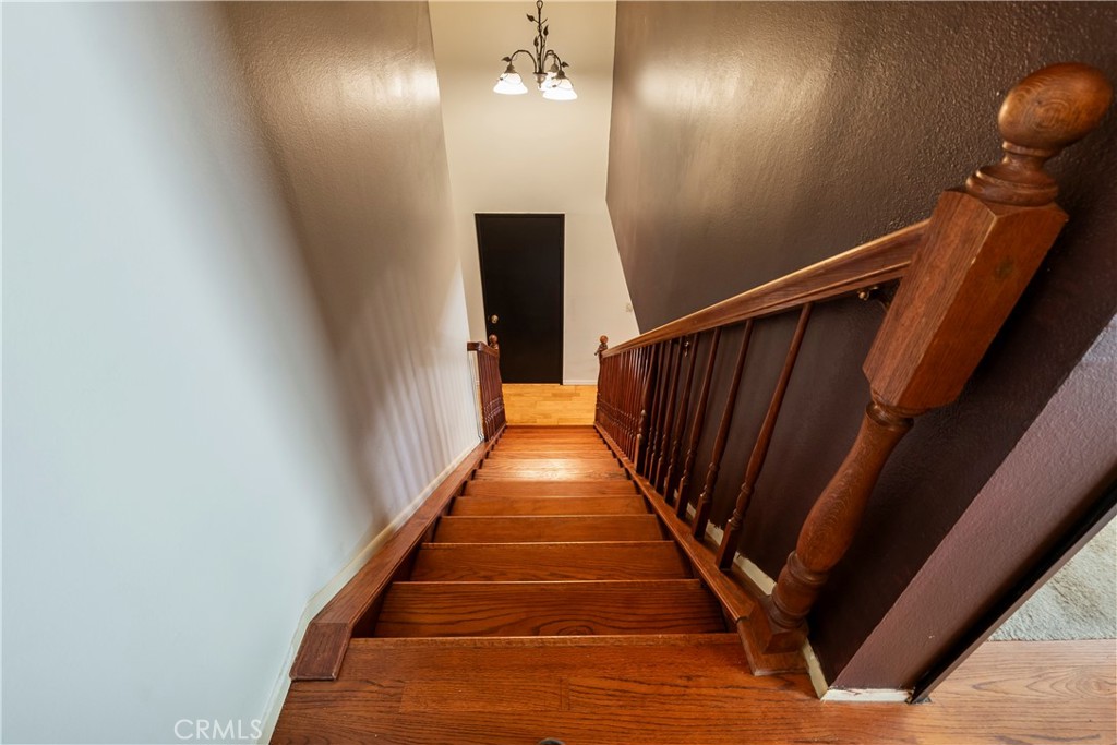 6624 Banyan Place Riverside, CA 92506 - Photo 24 of 41 Custom, solid wood hand crafted staircase - looking down from upstairs