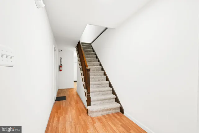 a view of entryway with wooden floor