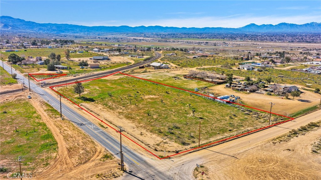 10420 Kiowa Road Apple Valley, CA 92308 - Photo 1 of 13 a view of a pool with a mountain