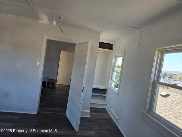 a view of an entryway with a window