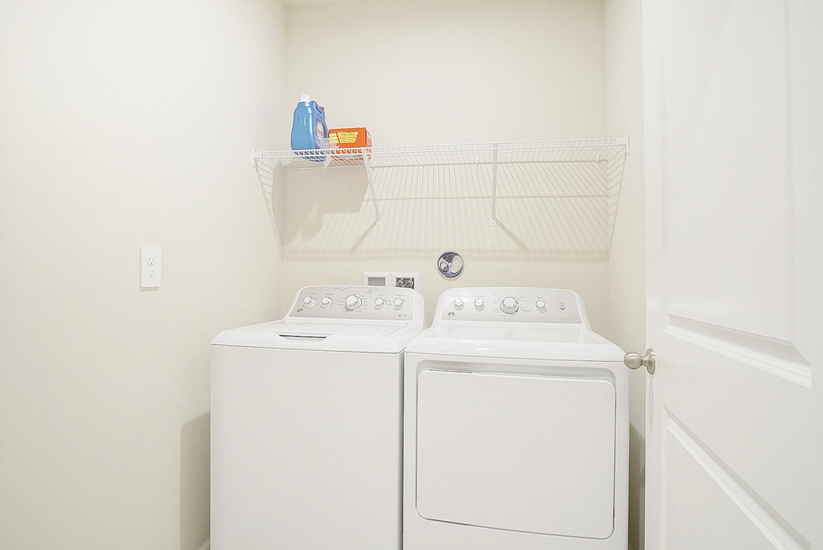 266 Raspberry Road Fort Pierce, FL 34981 - Photo 11 of 34 a utility room with dryer and washer