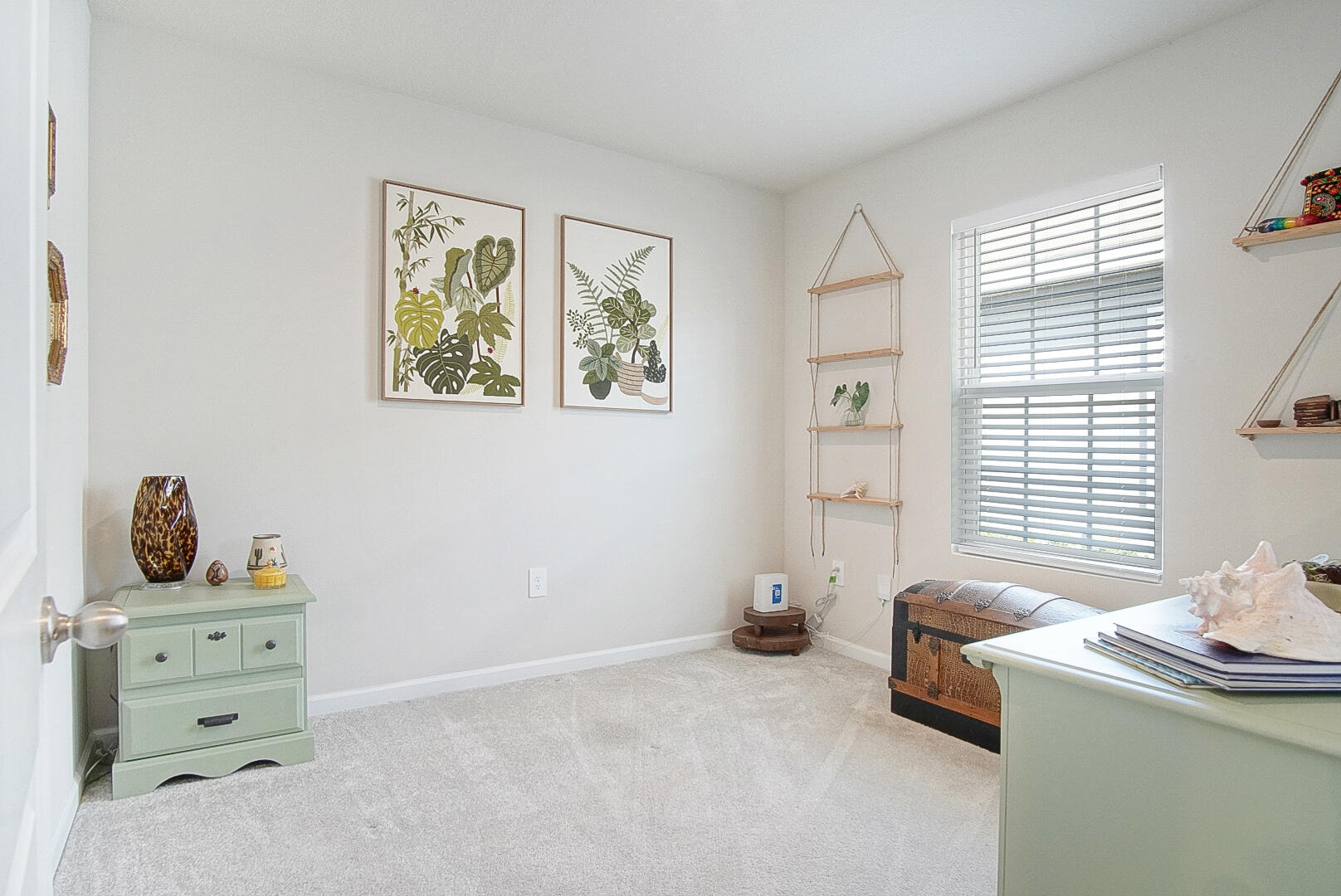 266 Raspberry Road Fort Pierce, FL 34981 - Photo 12 of 34 a bedroom with furniture and a window