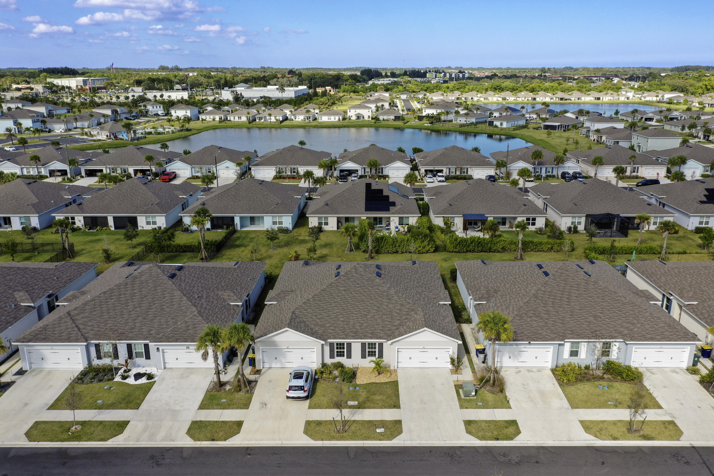 266 Raspberry Road Fort Pierce, FL 34981 - Photo 5 of 34 an aerial view of residential houses with outdoor space and parking