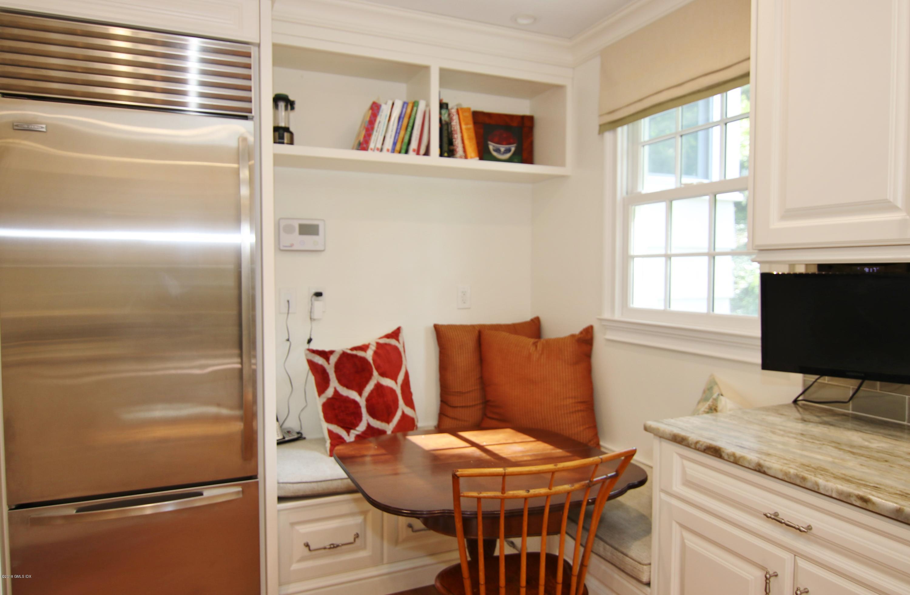 40 Glen Road Greenwich, CT 06830 - Photo 11 of 25 a living room with furniture and a window