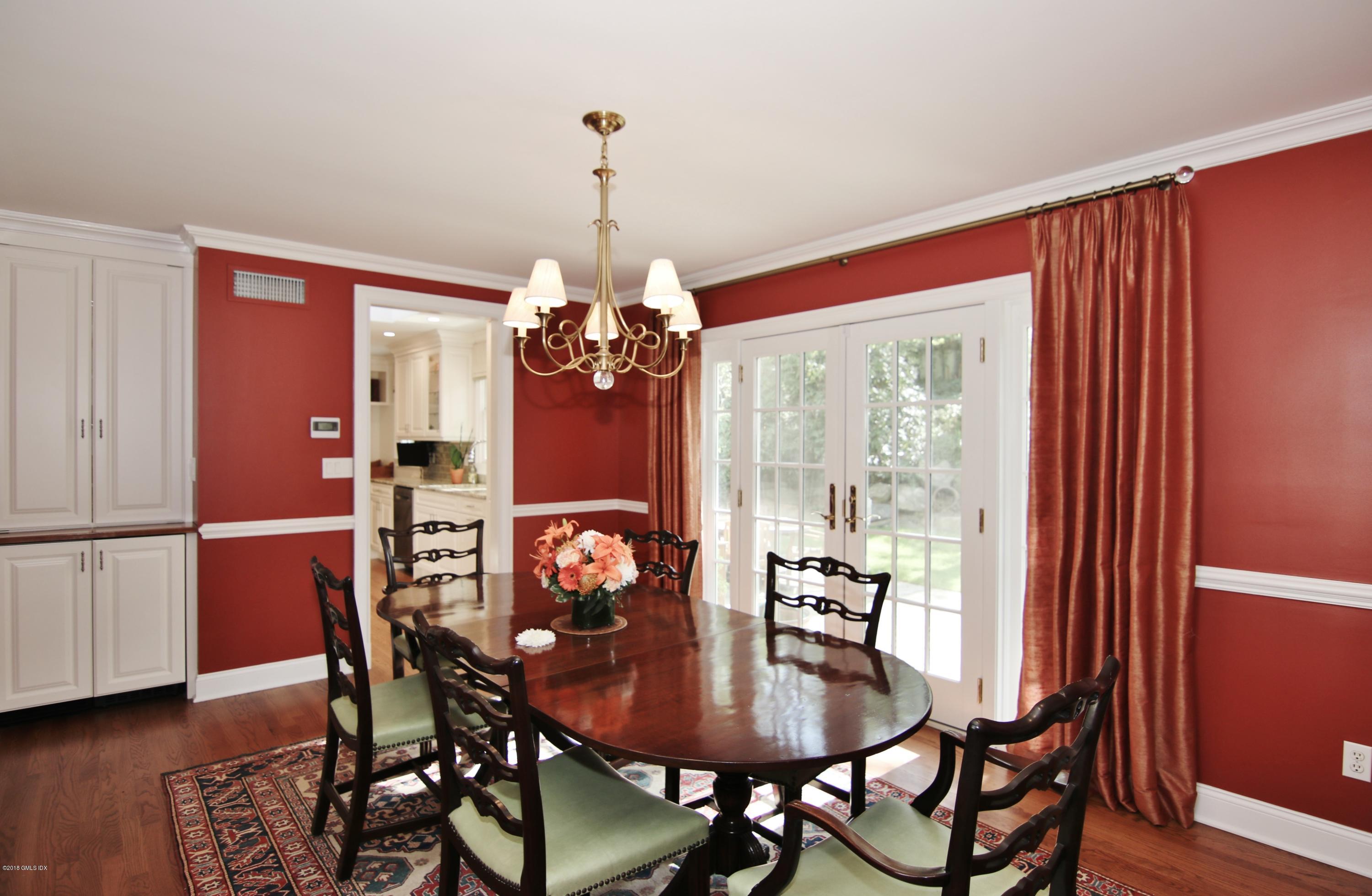 40 Glen Road Greenwich, CT 06830 - Photo 8 of 25 a view of a dining room with furniture window and wooden floor
