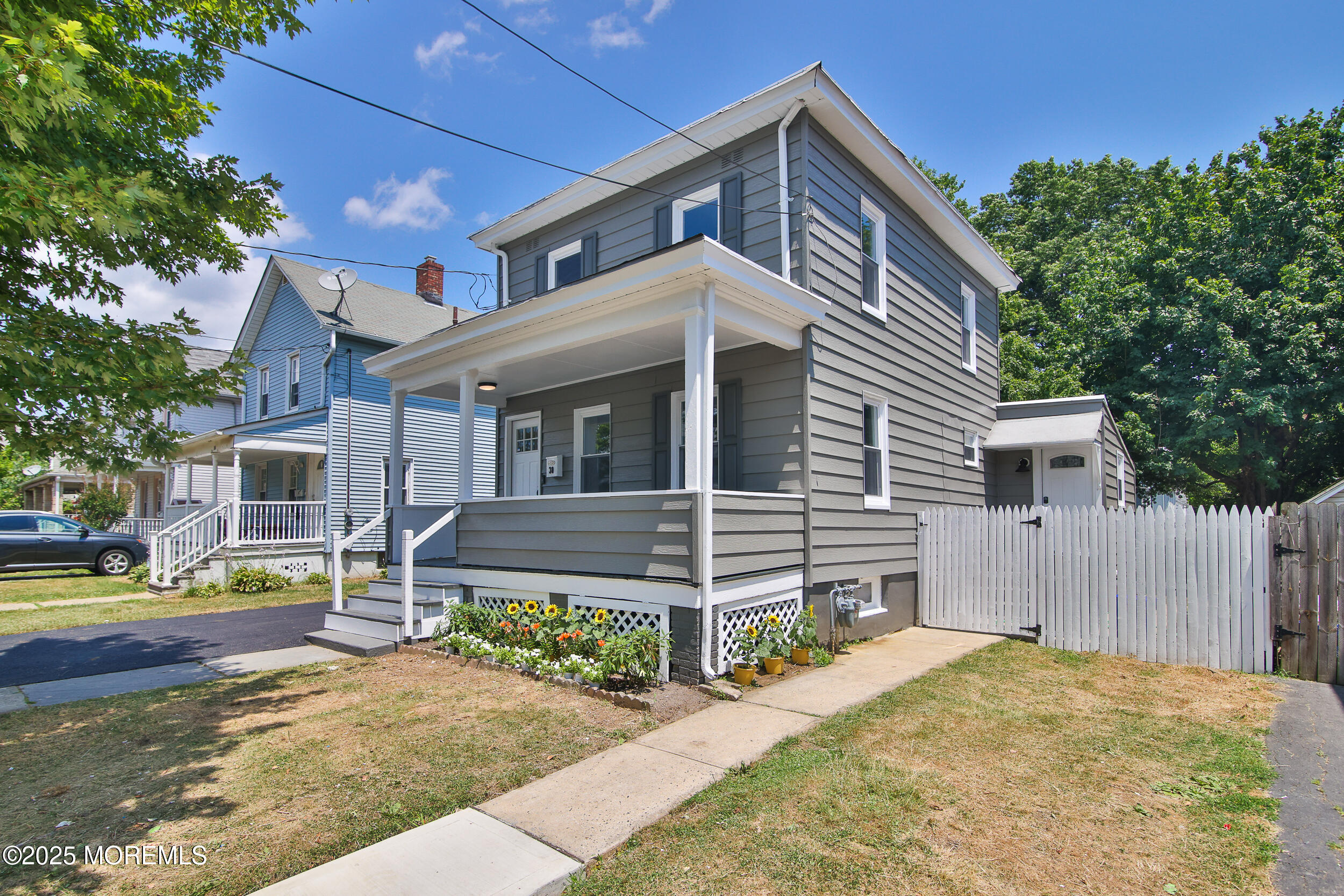 30 Conover Street Freehold, NJ 07728 - Photo 1 of 39 a front view of a house with a yard
