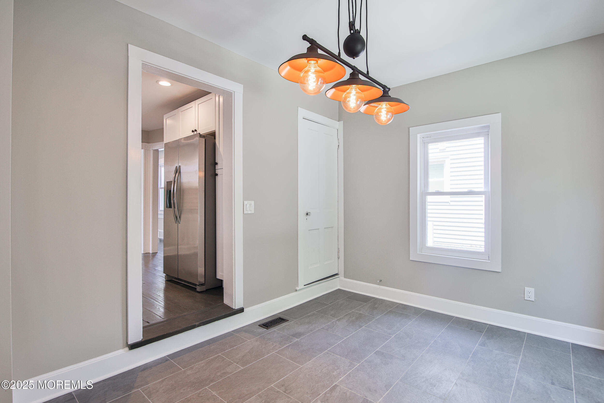 30 Conover Street Freehold, NJ 07728 - Photo 19 of 39 an empty room with windows and fan