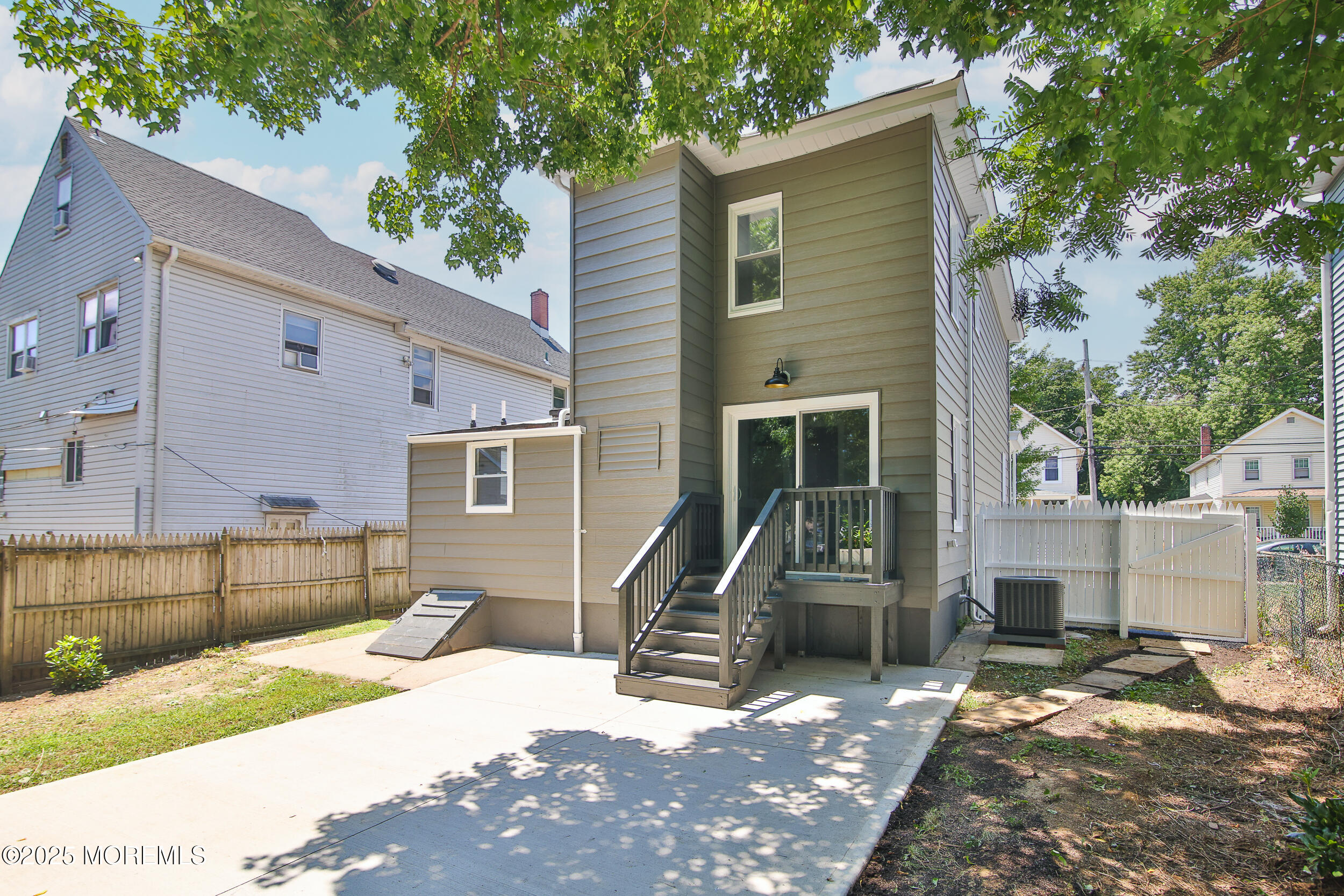 30 Conover Street Freehold, NJ 07728 - Photo 27 of 39 a front view of a house with a patio