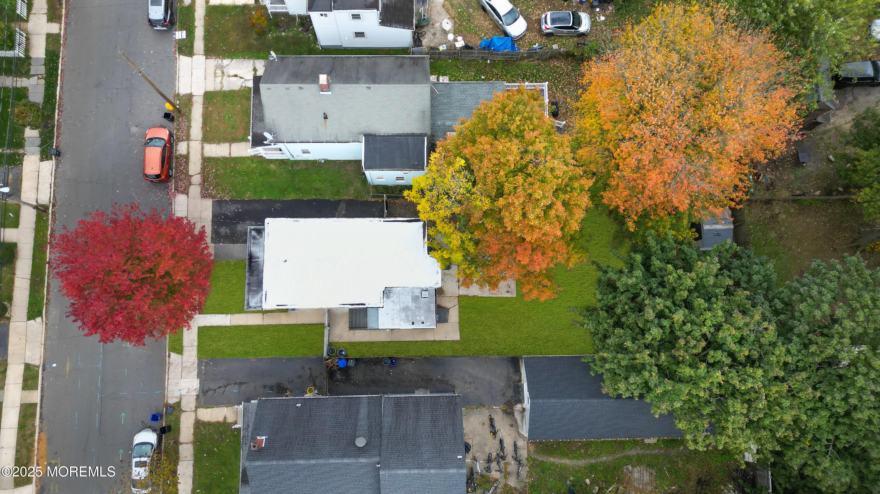 30 Conover Street Freehold, NJ 07728 - Photo 32 of 39 an aerial view of residential houses with outdoor space and swimming pool