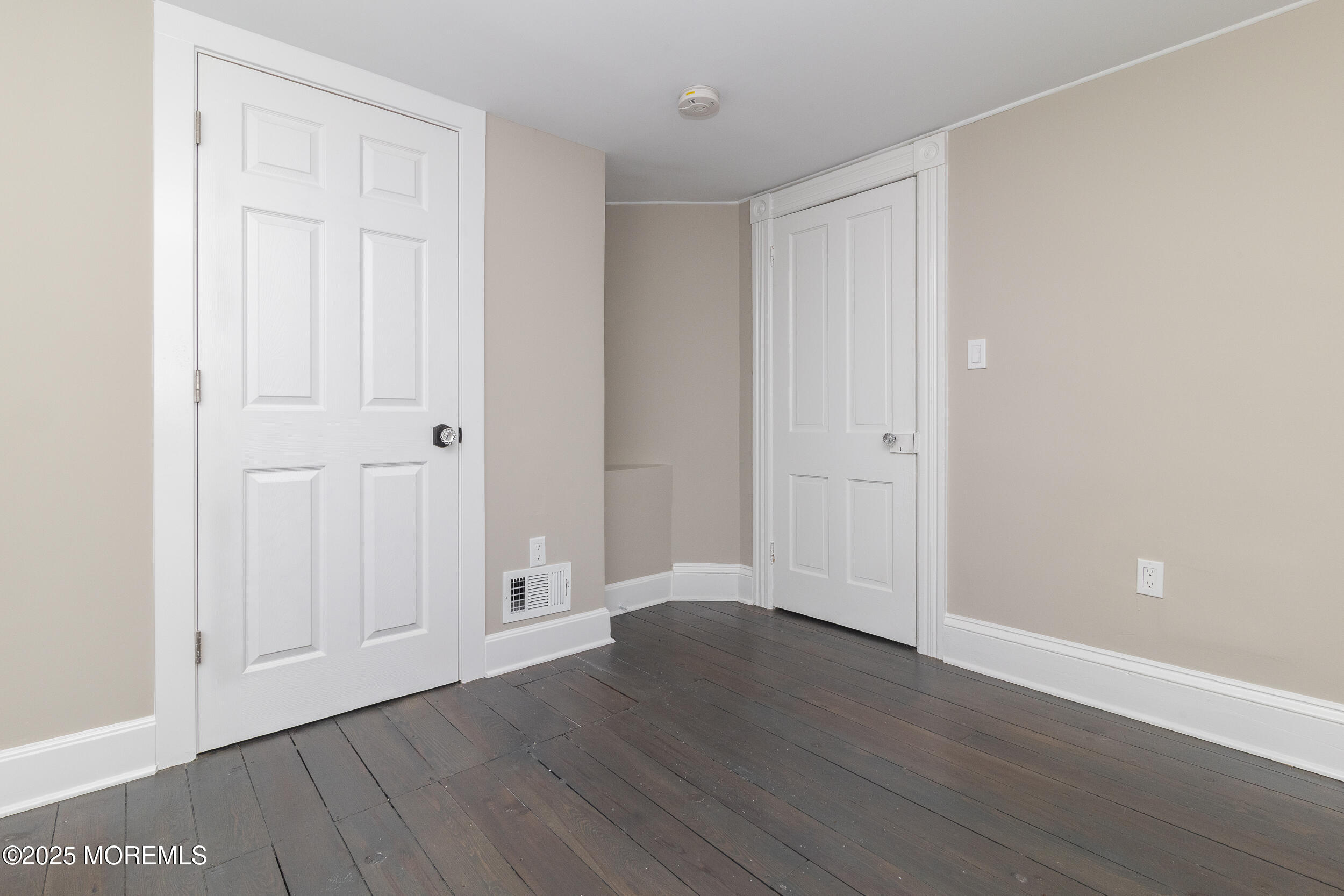 30 Conover Street Freehold, NJ 07728 - Photo 5 of 39 a view of an empty room with wooden floor