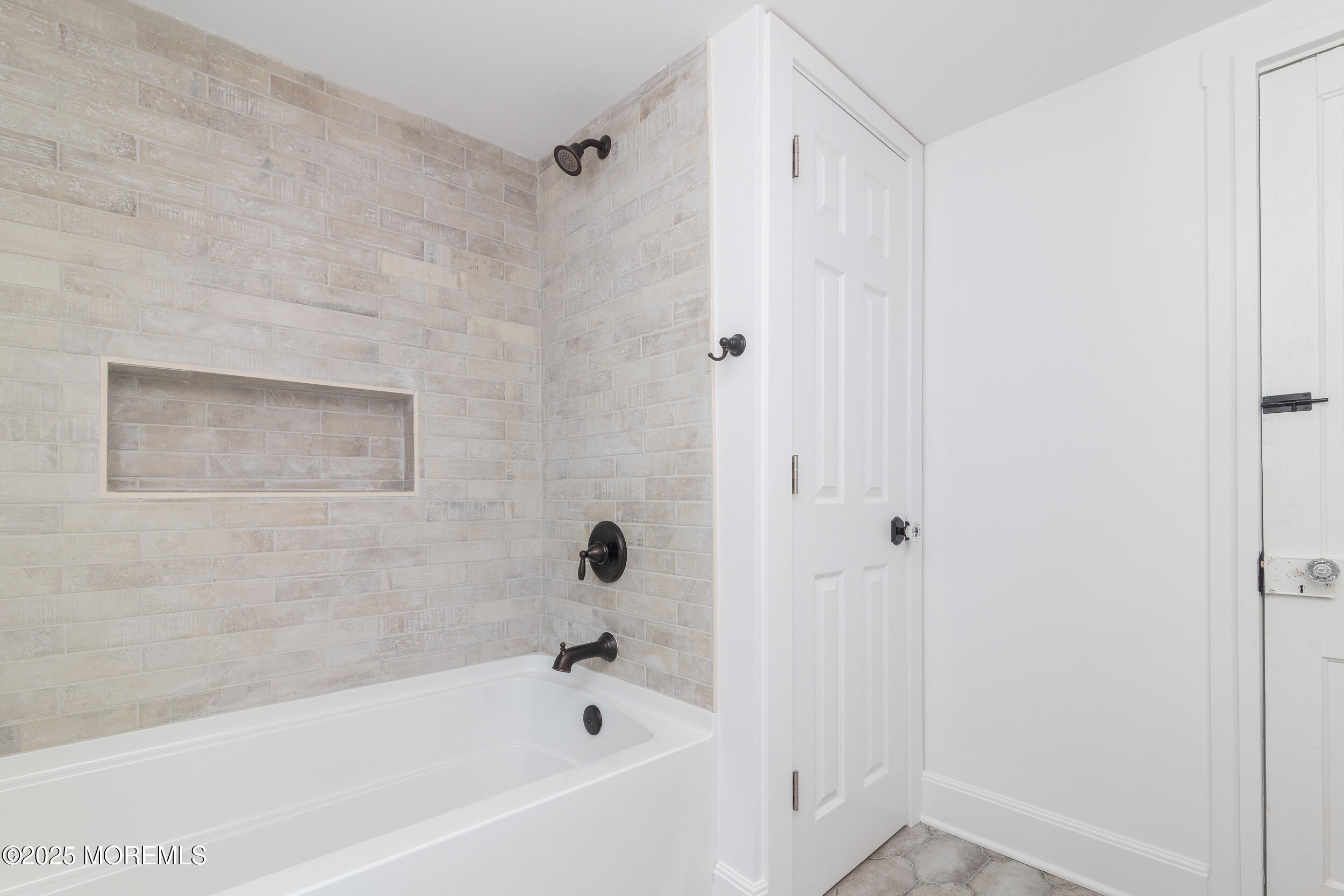 30 Conover Street Freehold, NJ 07728 - Photo 8 of 39 a bathroom with a bathtub
