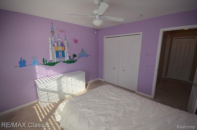 27458 Cromwell Road Novi, MI 48374 - Photo 19 of 39 Bedroom 2 with ample closet space and ceiling fan.