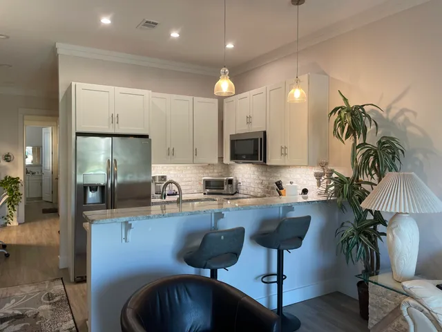 a bedroom with a bed and a couch