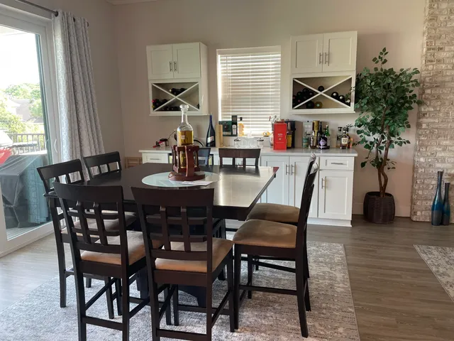 a living room with fireplace furniture and a flat screen tv