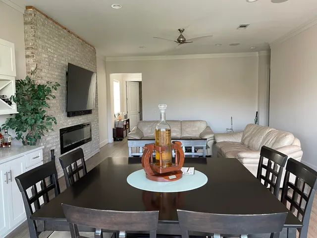 a kitchen with stainless steel appliances a microwave a stove and cabinets