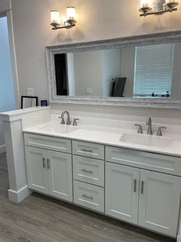 a bathroom with a bathtub and a window