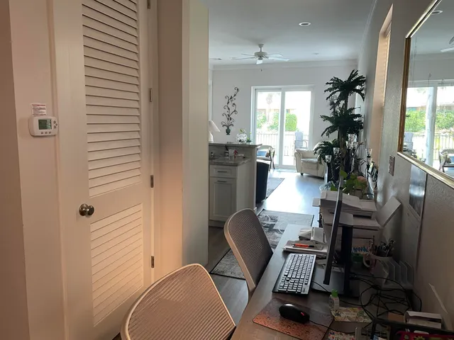 a kitchen with sink and window