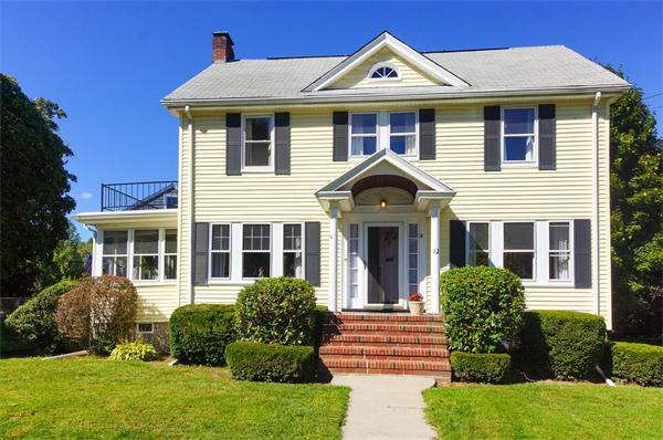 112 Cross Street Belmont, MA 02478 - Photo 1 of 22 a front view of a house with a yard