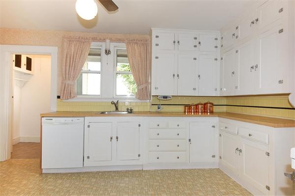 112 Cross Street Belmont, MA 02478 - Photo 5 of 22 a view of cabinets and window