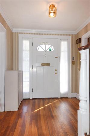 112 Cross Street Belmont, MA 02478 - Photo 9 of 22 an empty room with wooden floor and windows