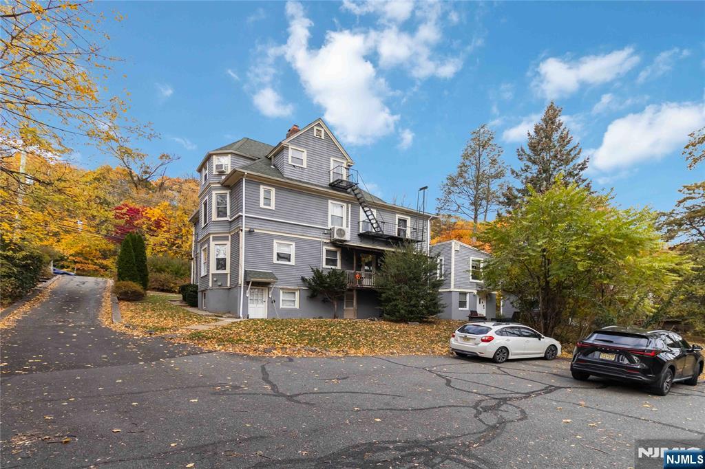1283 Valley Road, Unit 7 Montclair, NJ 07043 - Photo 25 of 26 a view of a car parked in front of a house
