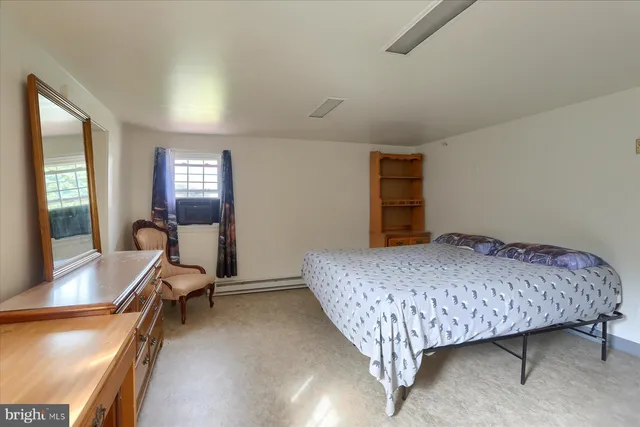 a picture of a book and a bed