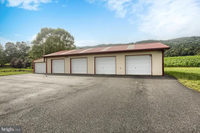 a view of a lake with houses in the back