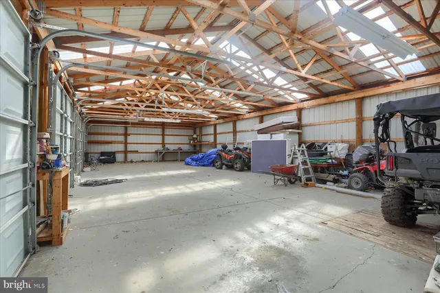 a view of a lake with houses in the back